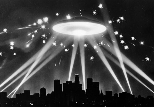 The famous 1942 Battle of Los Angeles searchlights converging on a UFO over the city during a WWII air raid.